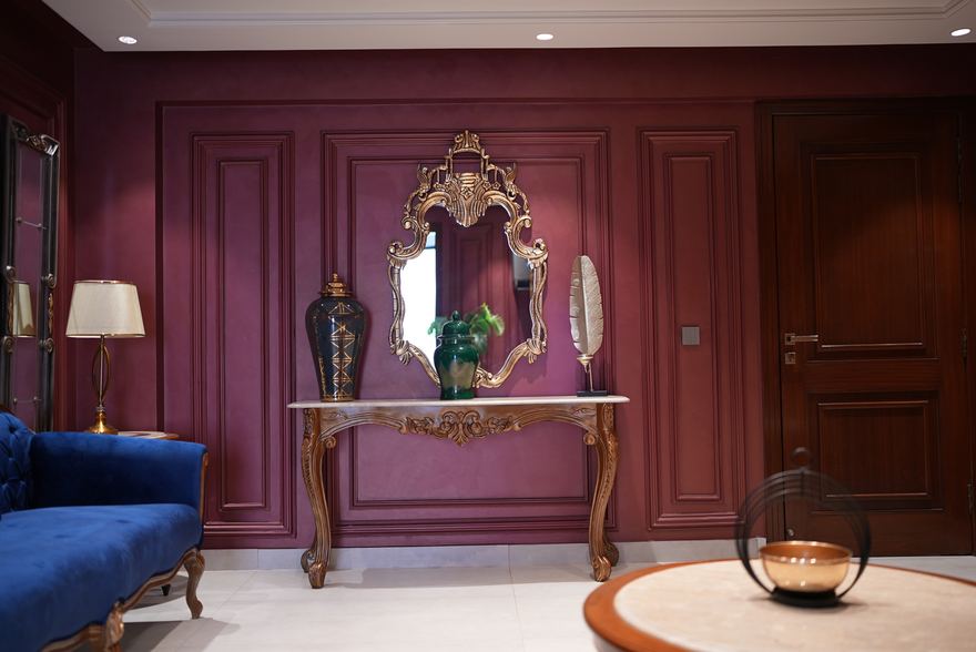 Burgundy panelled lounge at Casa Royal